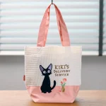 NICKY LA APRENDIZ DE BRUJA - BOLSO DE MANO "JIJI"