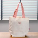 NICKY LA APRENDIZ DE BRUJA - BOLSO DE MANO "JIJI" - Imagen 2