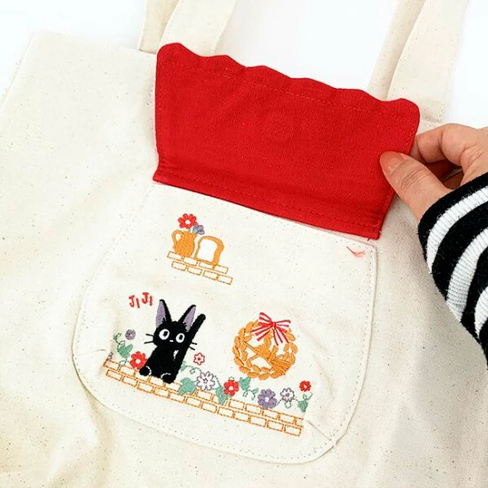NICKY, LA APRENDIZ DE BRUJA - BOLSO CON ASAS "JIJI ENTRE FLORES" - Imagen 2